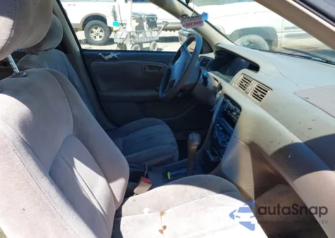 1999 Toyota Camry Le z USA, uszkodzony, nr VIN JT2BG22K6X0314611